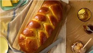 A loaf of braided brioche bread.