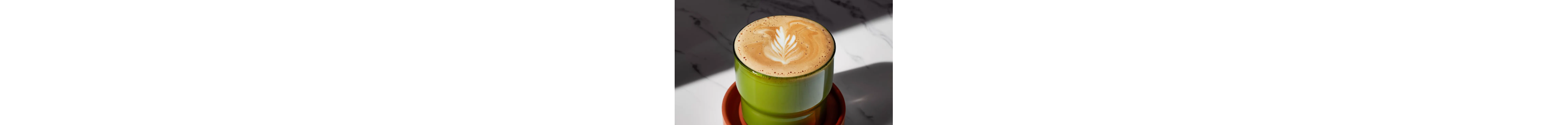 Flat white in a green ceramic cup