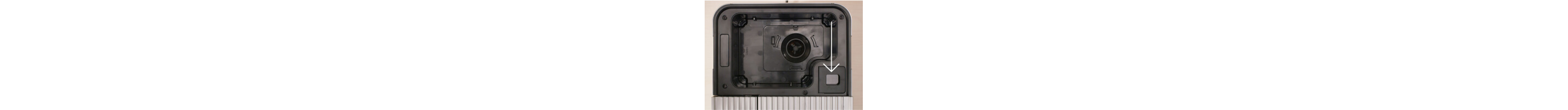 An arrow pointing to the bypass chute of the espresso machine