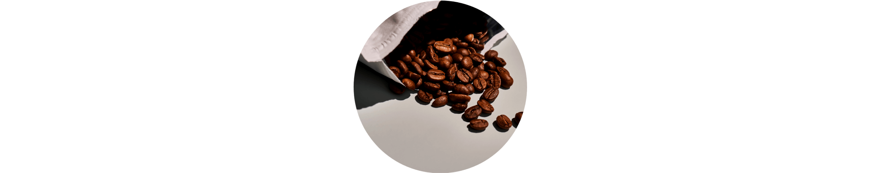 Coffee beans spilling out of a package