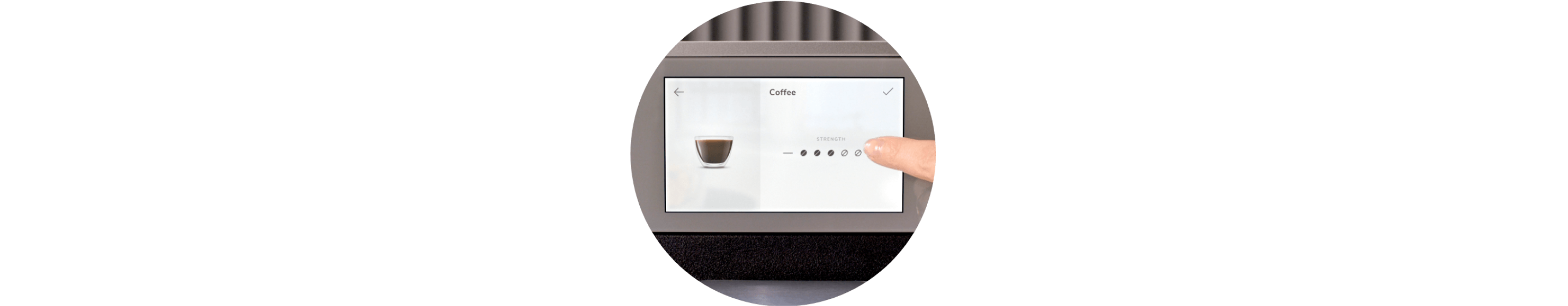 A finger selecting a setting on a KitchenAid® Espresso Machine