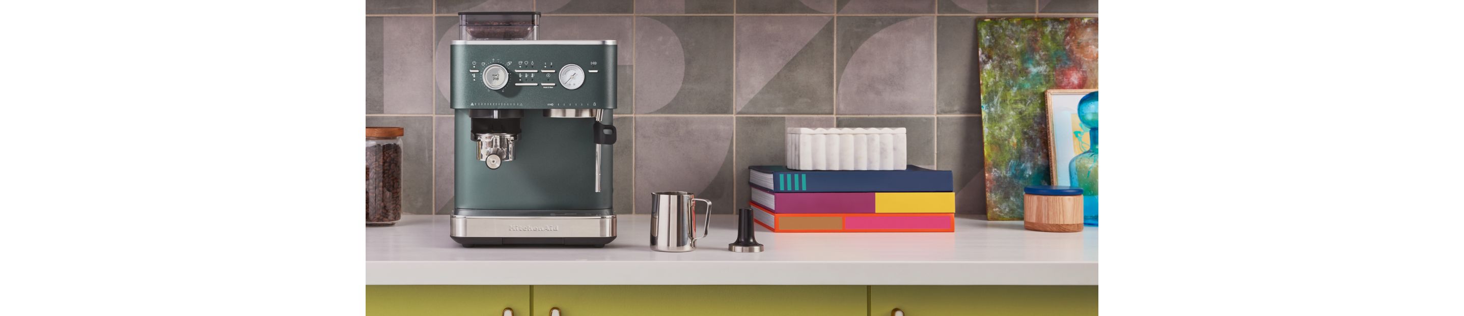 KitchenAid® Semi Automatic Espresso Machine with Burr Grinder in a colorful kitchen.
