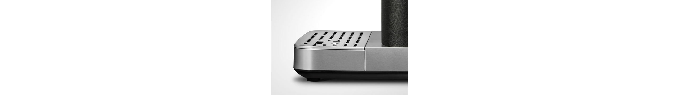 The drip tray attached to the base of an espresso machine