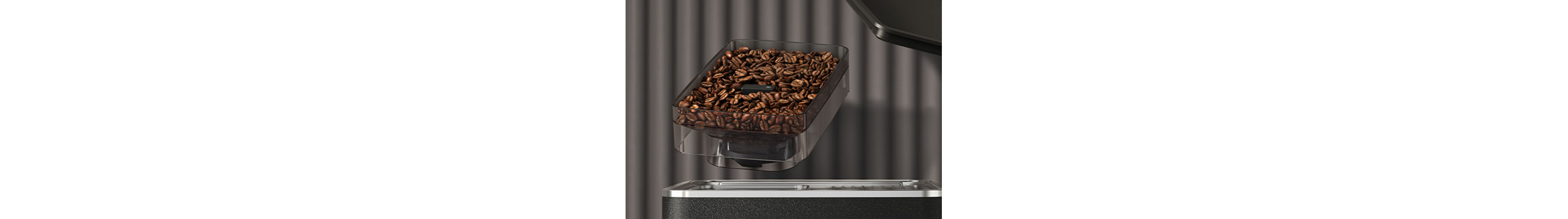 The removable bean hopper hovering above a KitchenAid® semi-automatic espresso machine