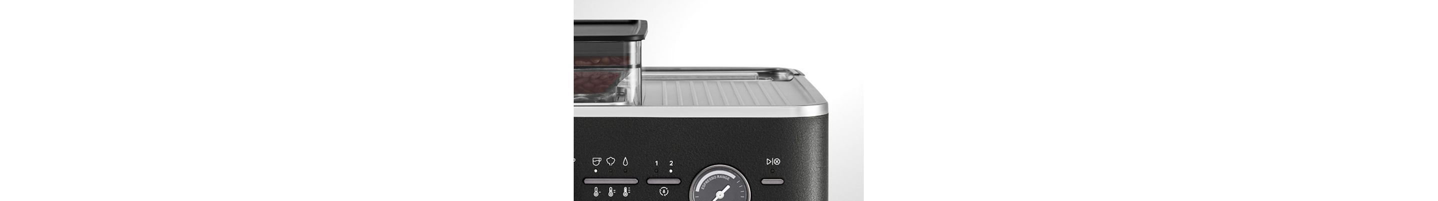 Flat cup warmer base on the top of a KitchenAid® semi-automatic espresso machine