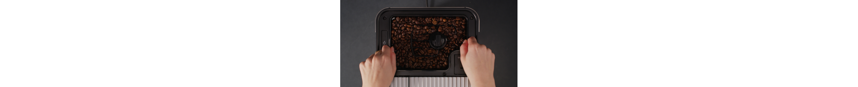 Two cups of espresso on an espresso machine drip tray
