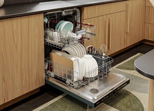 An open KitchenAid® dishwashers with dishes inside