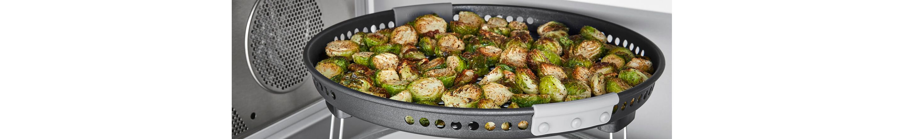 Brussels sprouts in an air fryer basket
