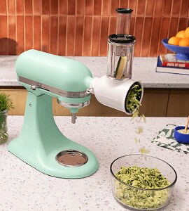 A KitchenAid® stand mixer with the spiralizer attachment