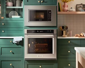 A KitchenAid® wall oven and microwave in a kitchen.