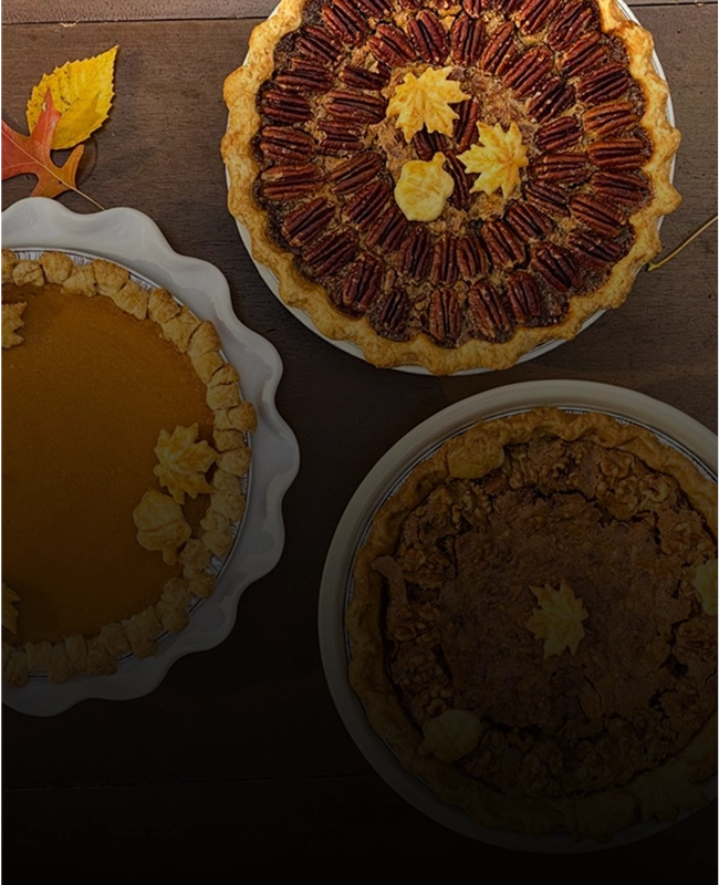 Three pies on a table.