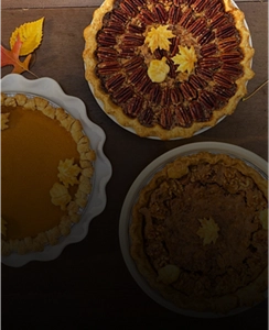 Three pies on a table.