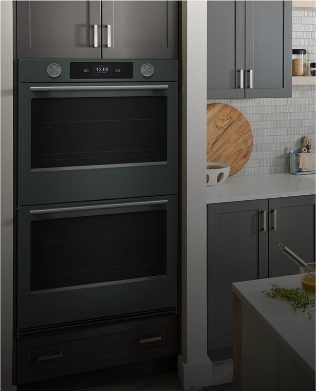 A KitchenAid® wall oven in Juniper.