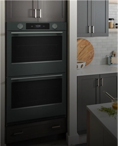A KitchenAid® wall oven in Juniper.