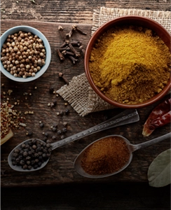 Various seasonings and ingredients on a table.