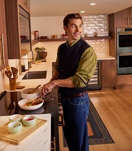 Chef Antoni Porowski prepping a dish at Room to Host
