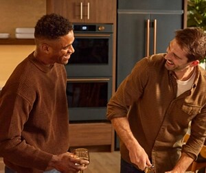 People cooking together at Room to Host