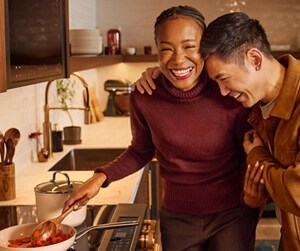 People embracing at Room to Host