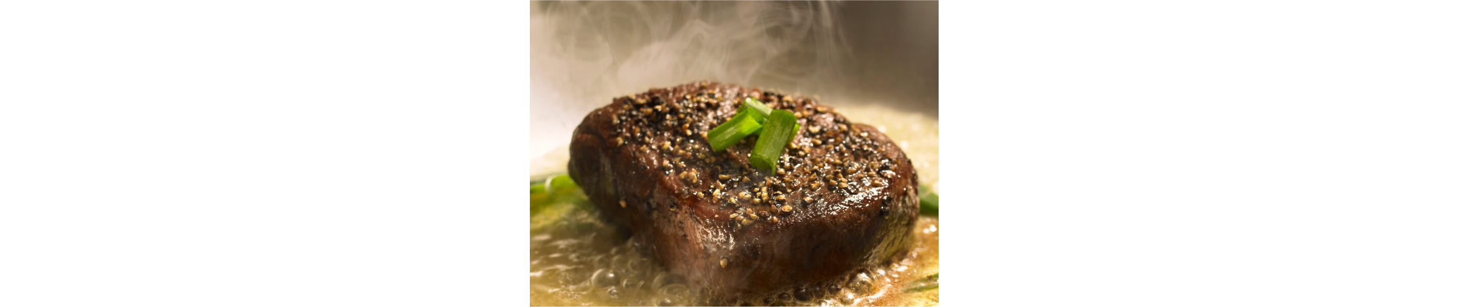 Rib cap seasoned with cracked pepper and green onions