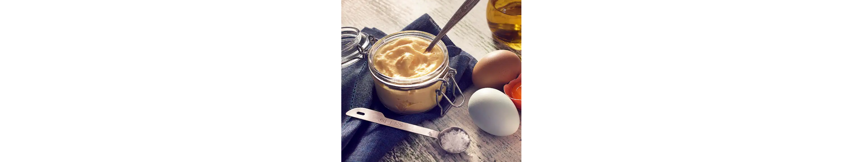 A jar of creamy vegan aioli 