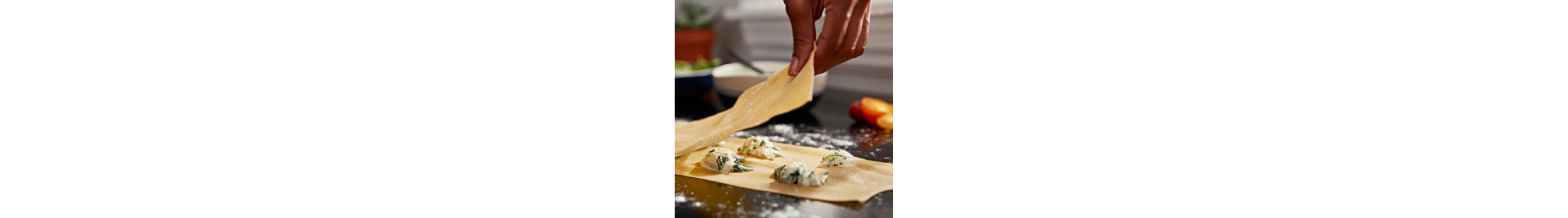 Close up of person making ravioli