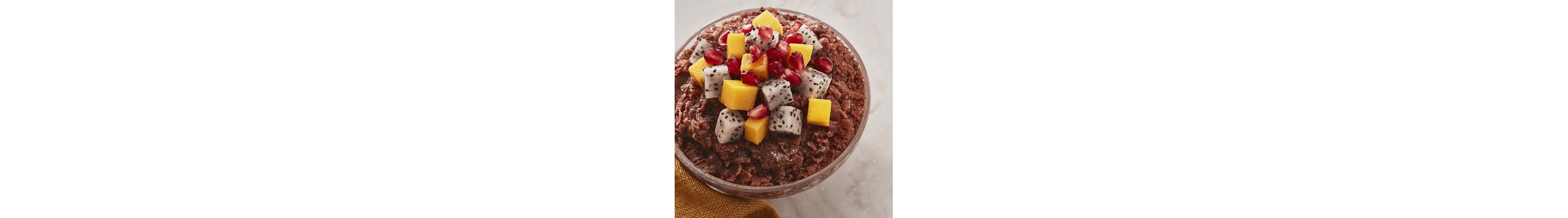 Baobing topped with diced mangoes and dragon fruit