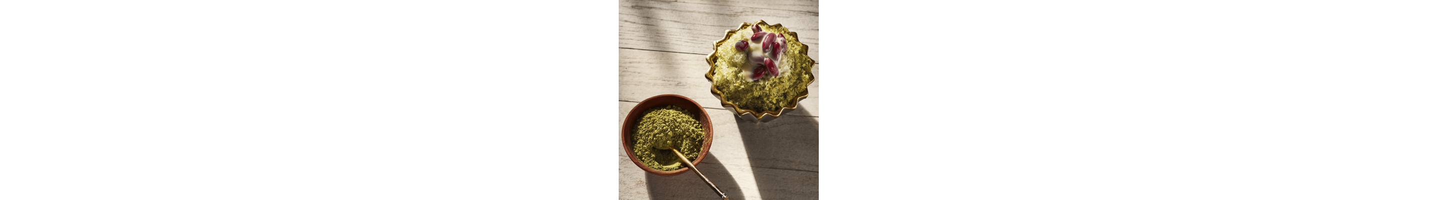Korean shaved ice dessert topped with red beans and matcha powder