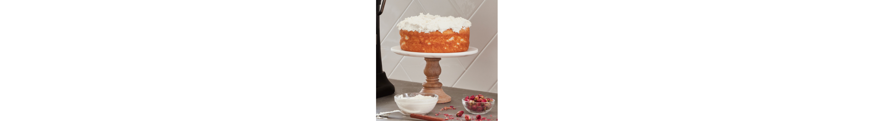Cake layers and ingredients on a counter