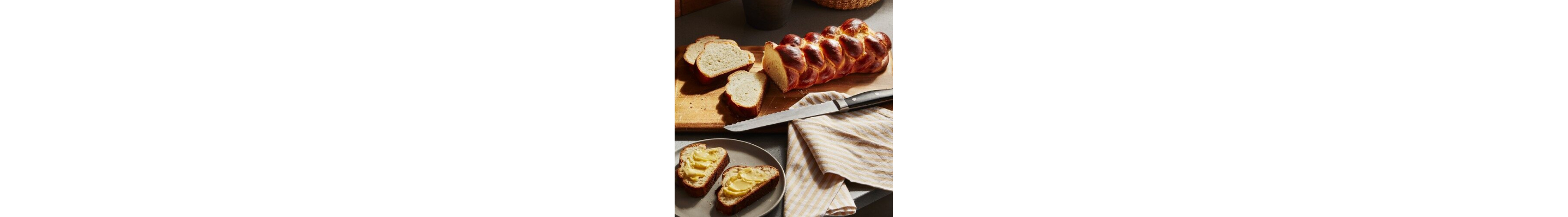 Homemade bread sliced on a cutting board