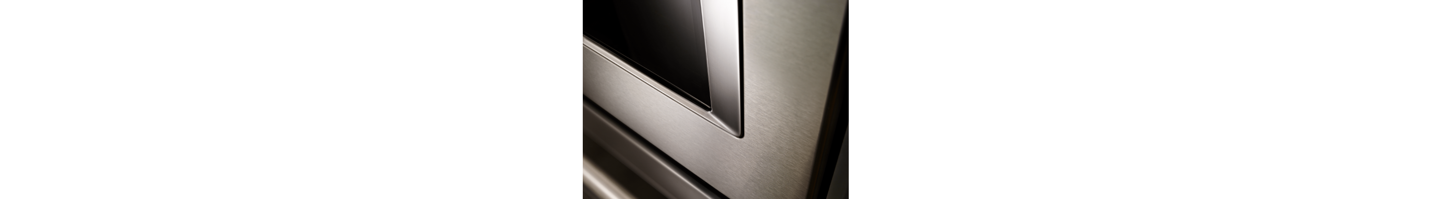 Close up image of an oven with stainless steel finish