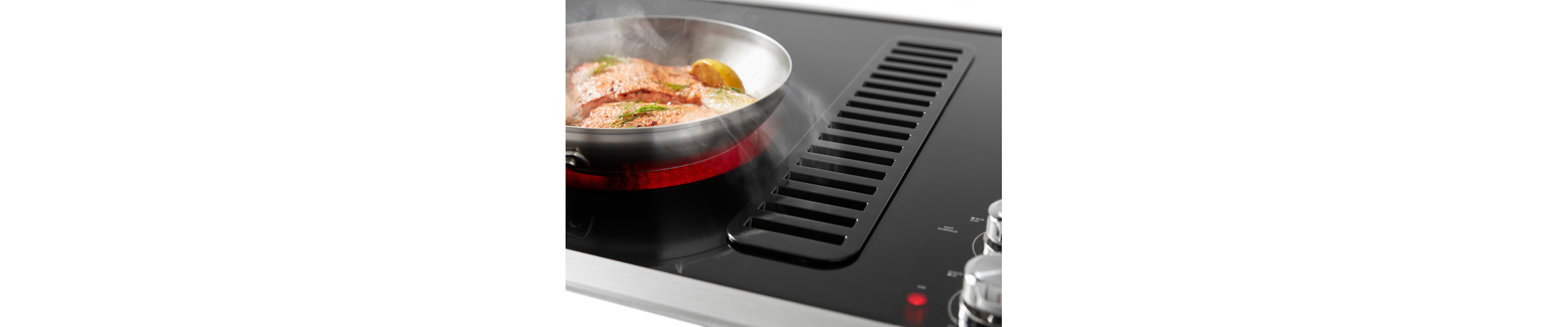A downdraft electric cooktop
