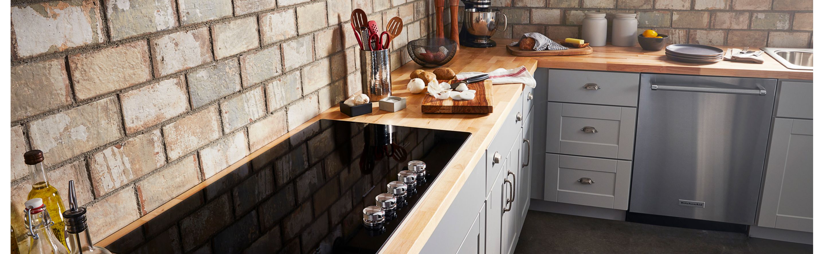 A black electric cooktop on a countertop