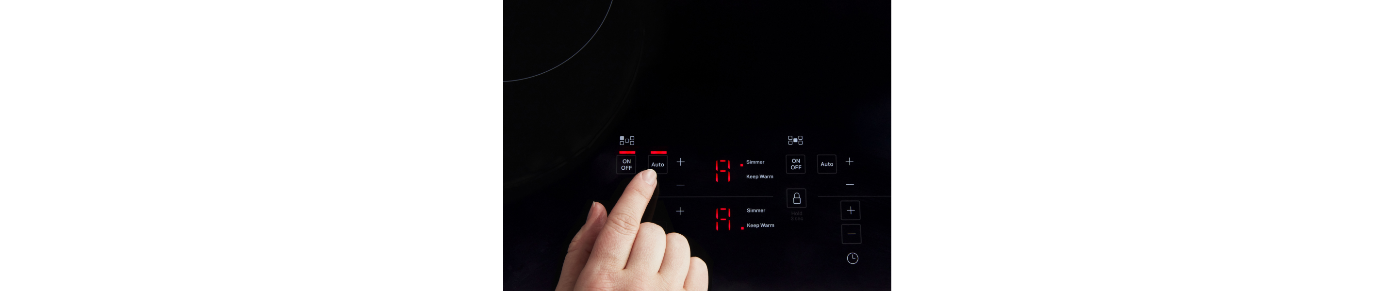 A finger selecting a KitchenAid® induction cooktop feature