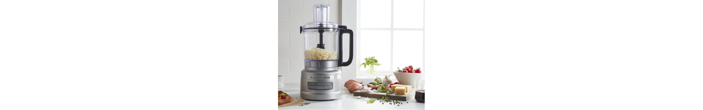 KitchenAid® food processor with grated cheese