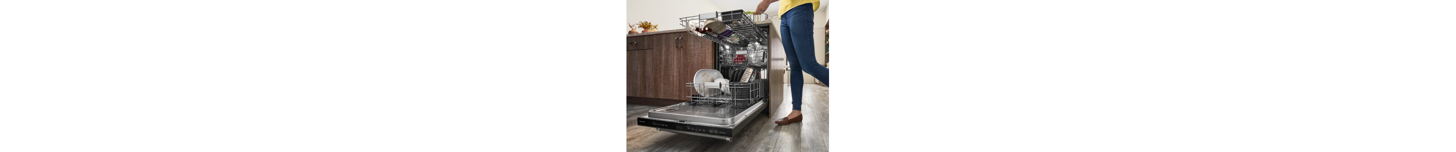 Person putting dishes in KitchenAid® dishwasher