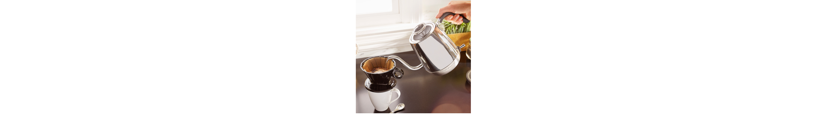 Stainless steel KitchenAid® goose-necked kettle brewing pour-over coffee