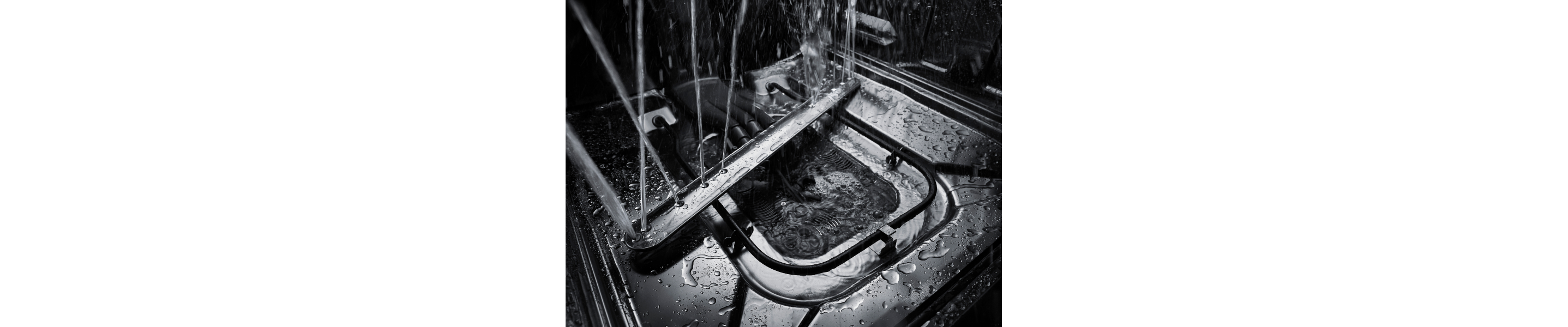 Dishwasher spray arm spraying water 