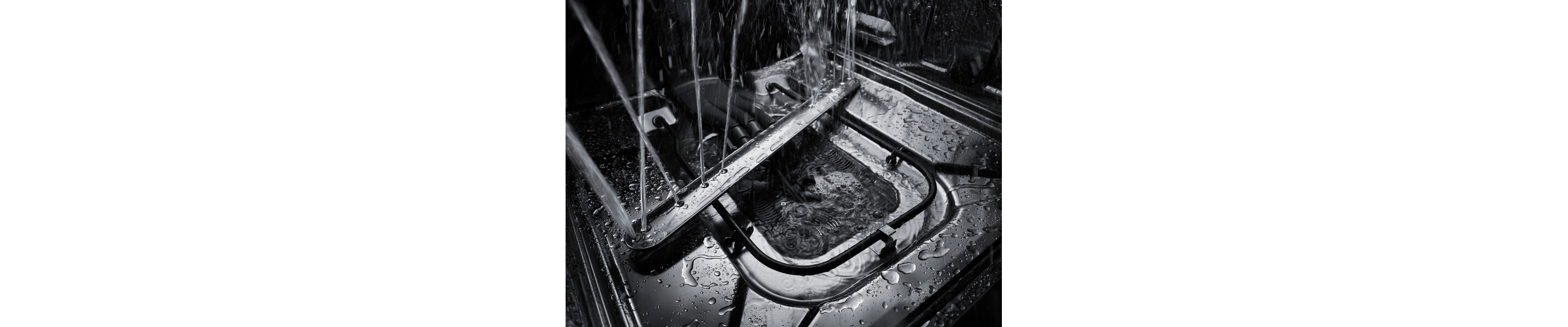 Dishwasher spray arm spraying water 