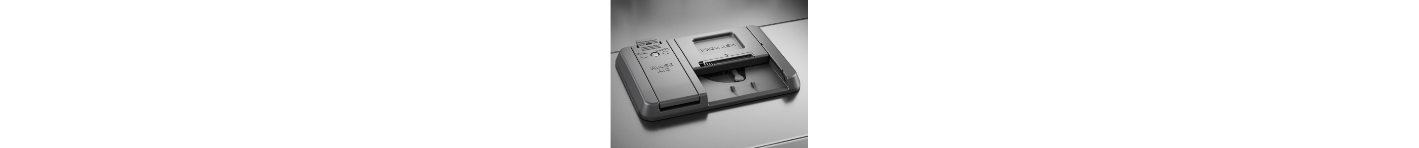 Close up image of a dishwasher detergent dispenser 