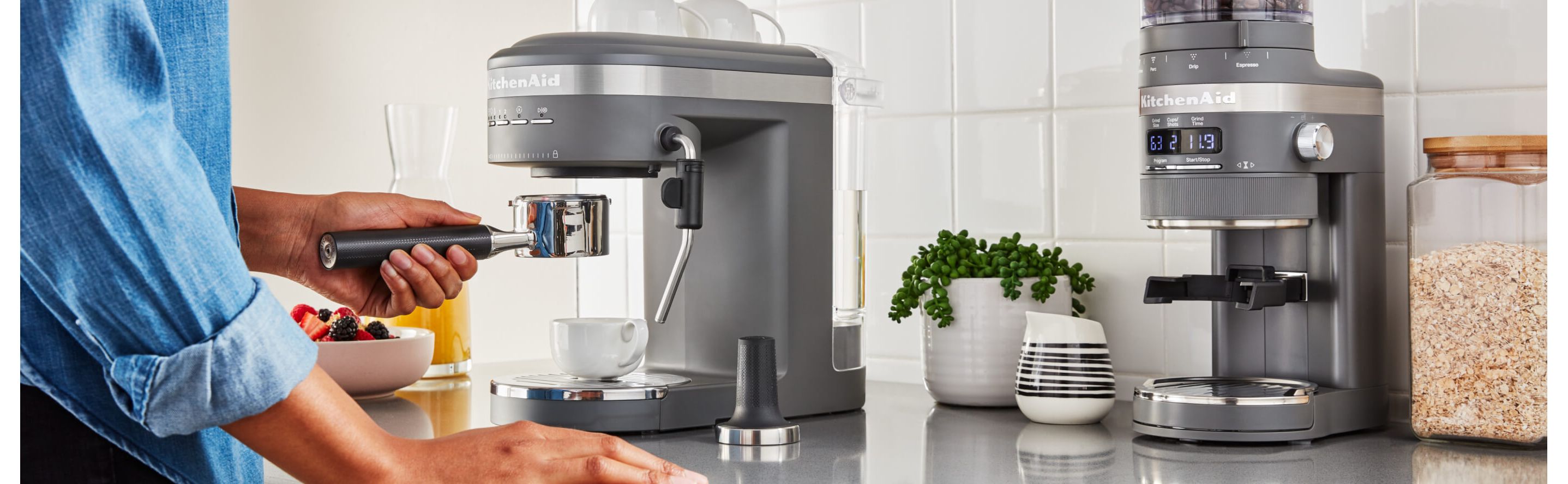 Person placing a portafilter on a semi-automatic espresso machine