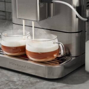 Glass coffee cups on a coffee maker 