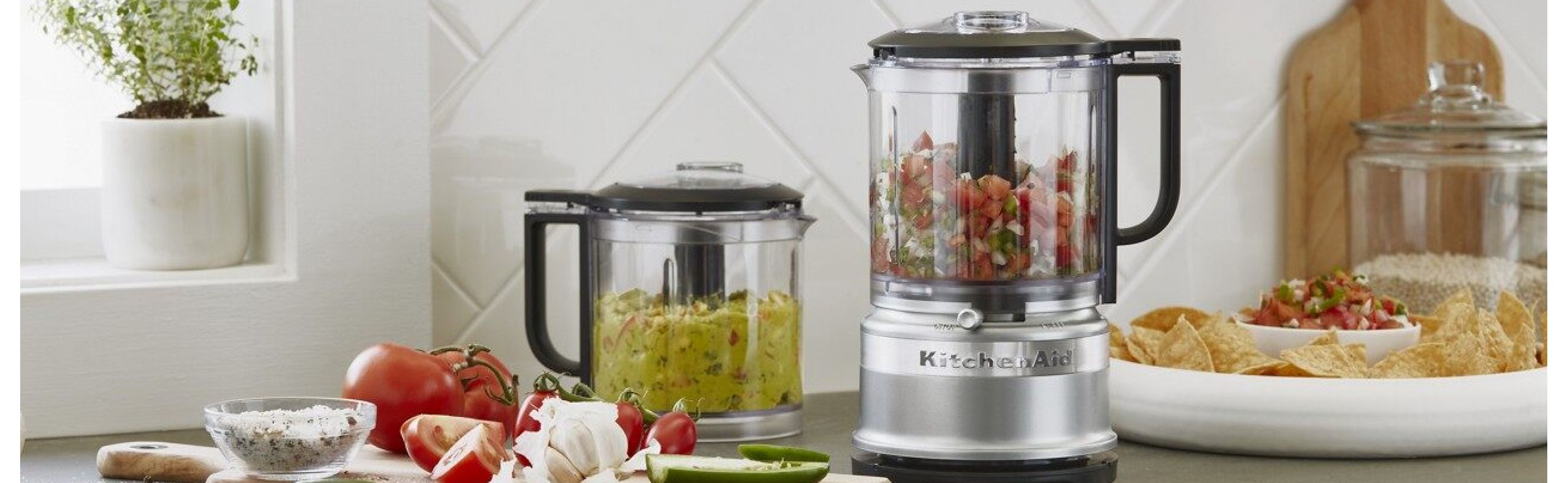 Silver KitchenAid® food processor on kitchen counter