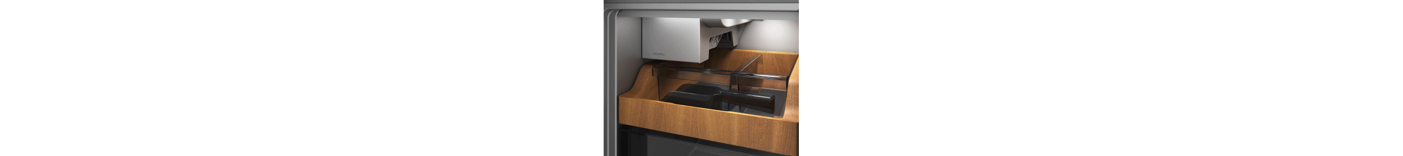 Wood-framed shelving surrounding an empty ice maker