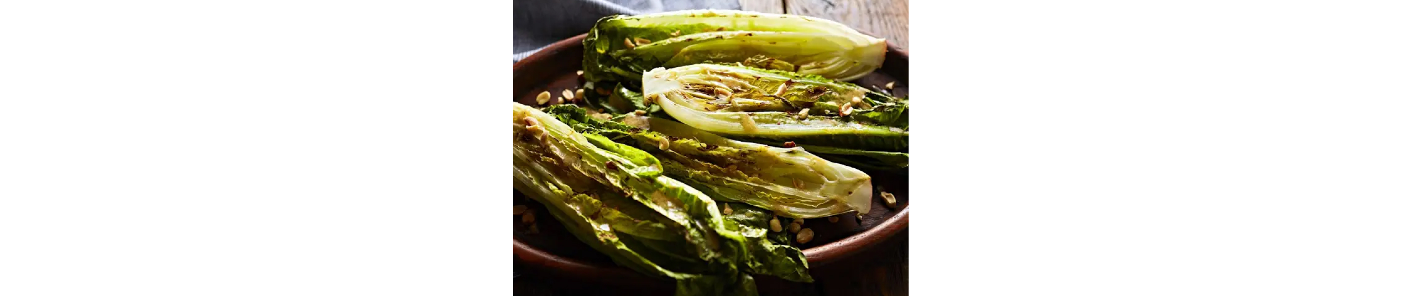 Grilled romaine on platter