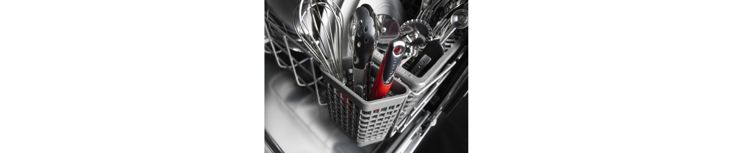The silverware basket of a KitchenAid® dishwasher.