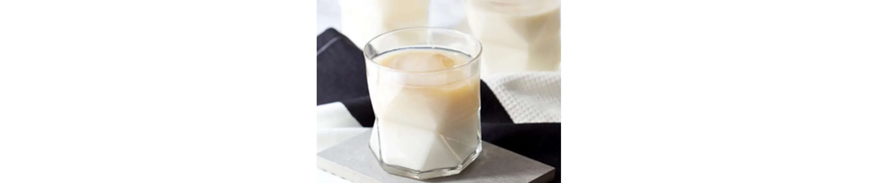 Glass of white tea with milk
