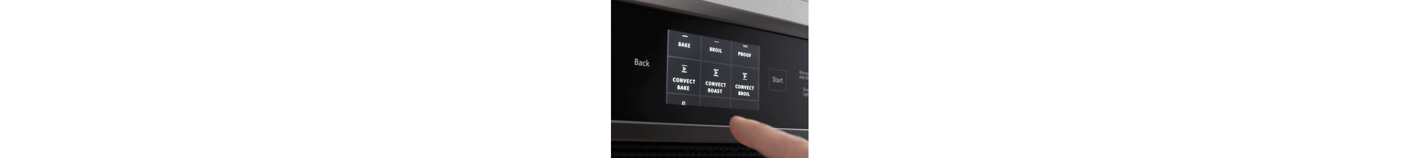 Finger selecting an oven setting
