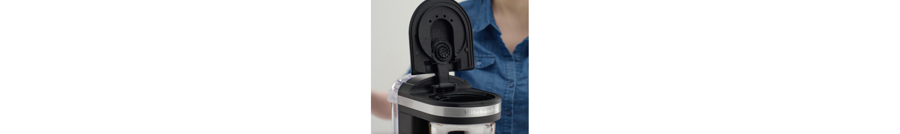 Drip coffee maker with lid open