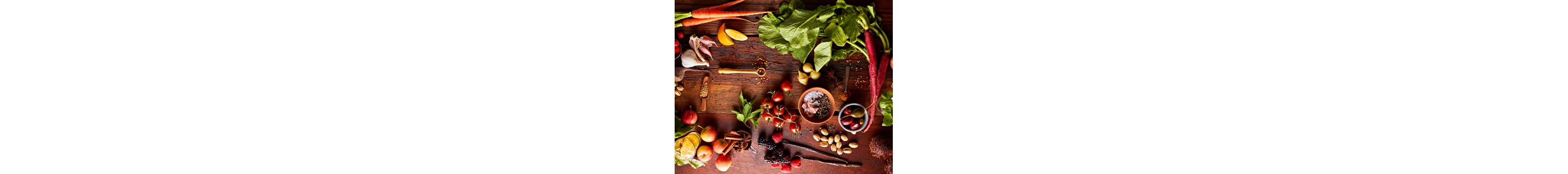 Assorted vegetables on a wooden cutting board