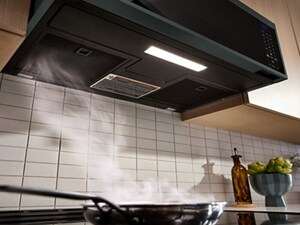 Smoke pulling into a built-in microwave’s ventilation system